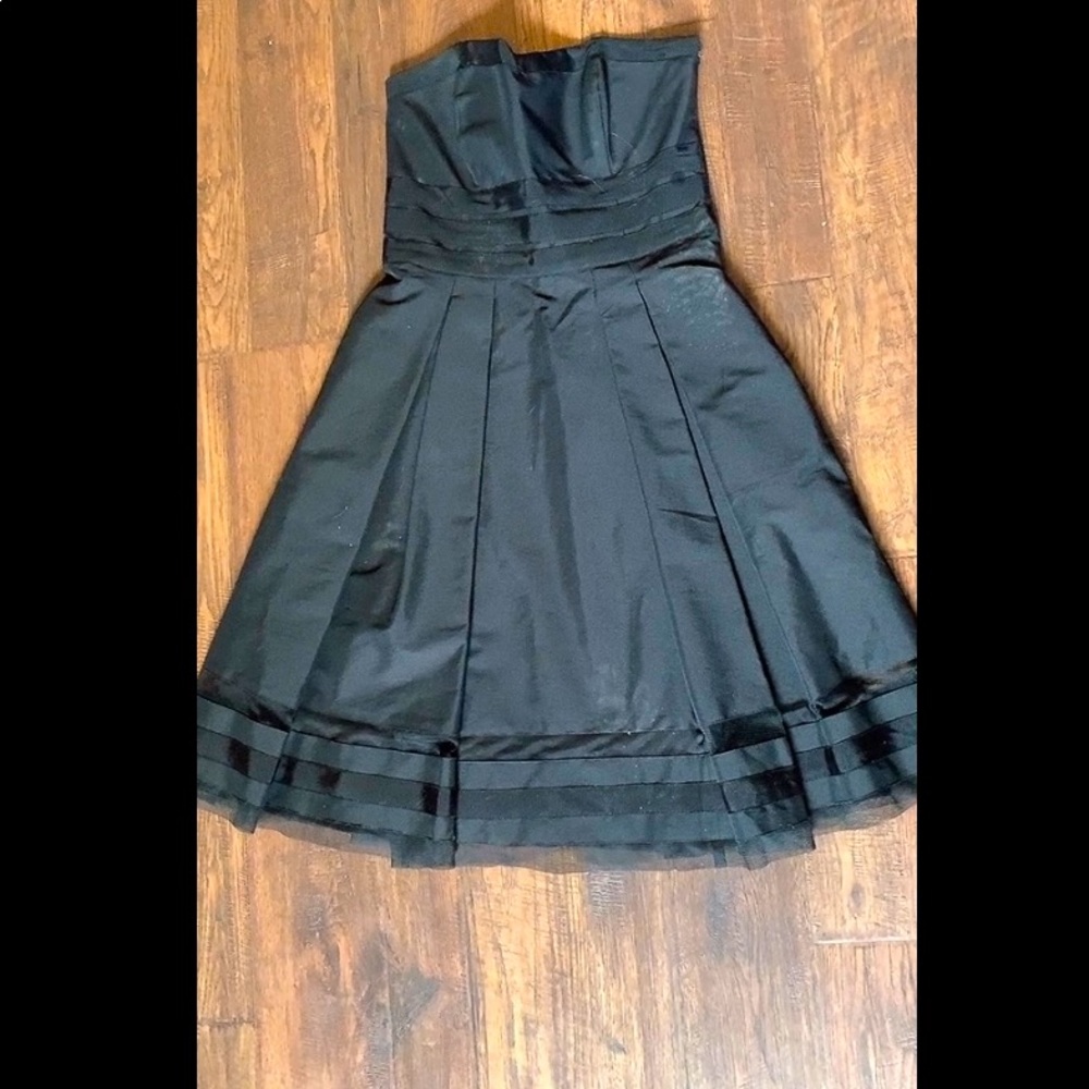 Black strapless, pleated dress